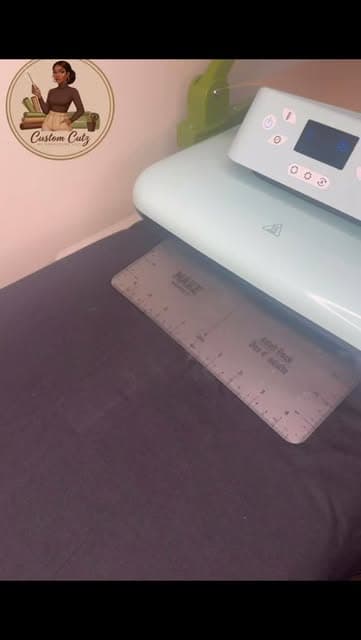Heat press machine set up for a custom apparel order
